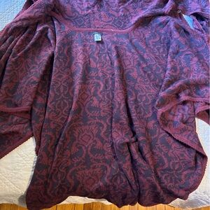 Novica Alpaca blend button front poncho with attached scarf with fringe.